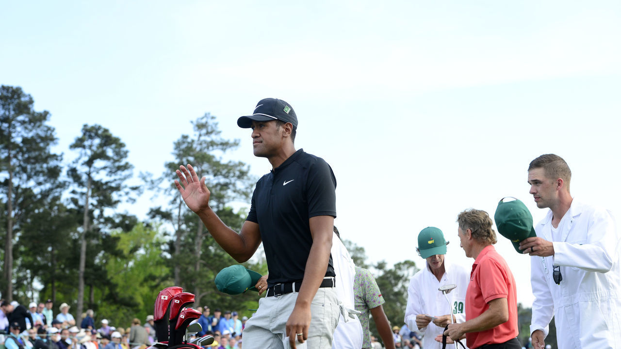 Tony Finau finishes his round on Hole No. 9 during Round 1 of the Masters at Augusta National Golf Club, Thursday, April 5, 2018.