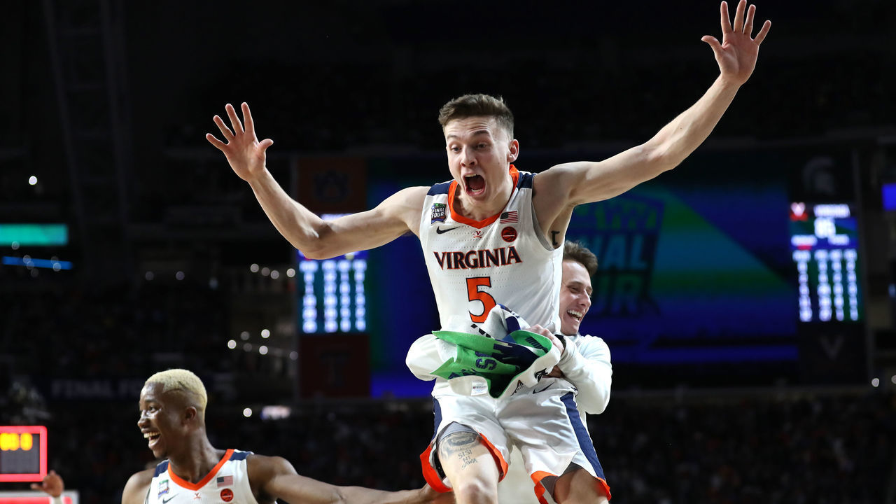 MINNEAPOLIS, MINNESOTA - APRIL 08: Kyle Guy #5 of the Virginia Cavaliers celebrate his teams 85-77 win over the Texas Tech Red Raiders to win the the 2019 NCAA men's Final Four National Championship game at U.S. Bank Stadium on April 08, 2019 in Minneapolis, Minnesota.