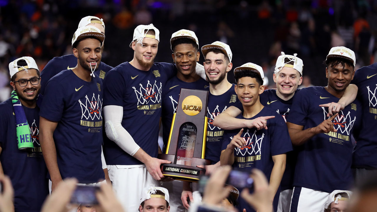 MINNEAPOLIS, MINNESOTA - APRIL 08: The Virginia Cavaliers celebrate with the trophy after their 85-77 win over the Texas Tech Red Raiders during the 2019 NCAA men's Final Four National Championship game at U.S. Bank Stadium on April 08, 2019 in Minneapolis, Minnesota.