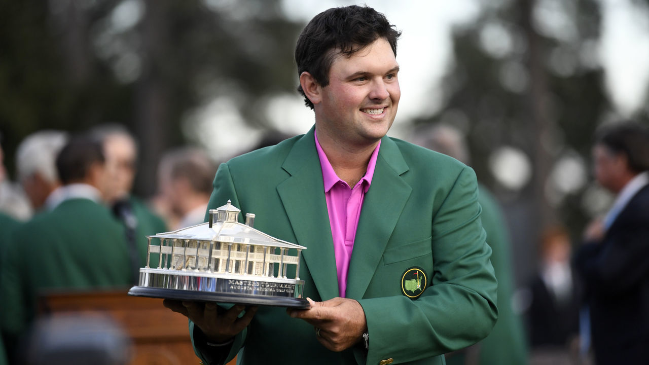 Masters Champion Patrick Reed holds the Masters Trophy during Green Jacket Presentation Ceremony at Augusta National Golf Club, on Sunday, April 8, 2018.