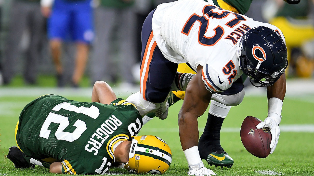 GREEN BAY, WI - SEPTEMBER 09: Aaron Rodgers #12 of the Green Bay Packers lays on the ground after injuring his leg in the second quarter of a game against the Chicago Bears at Lambeau Field on September 9, 2018 in Green Bay, Wisconsin.