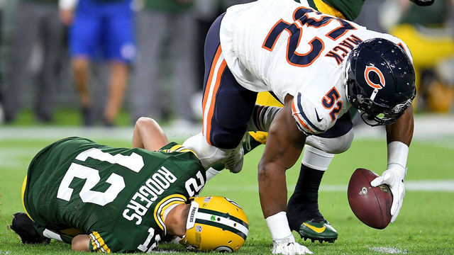 GREEN BAY, WI - SEPTEMBER 09: Aaron Rodgers #12 of the Green Bay Packers lays on the ground after injuring his leg in the second quarter of a game against the Chicago Bears at Lambeau Field on September 9, 2018 in Green Bay, Wisconsin.
