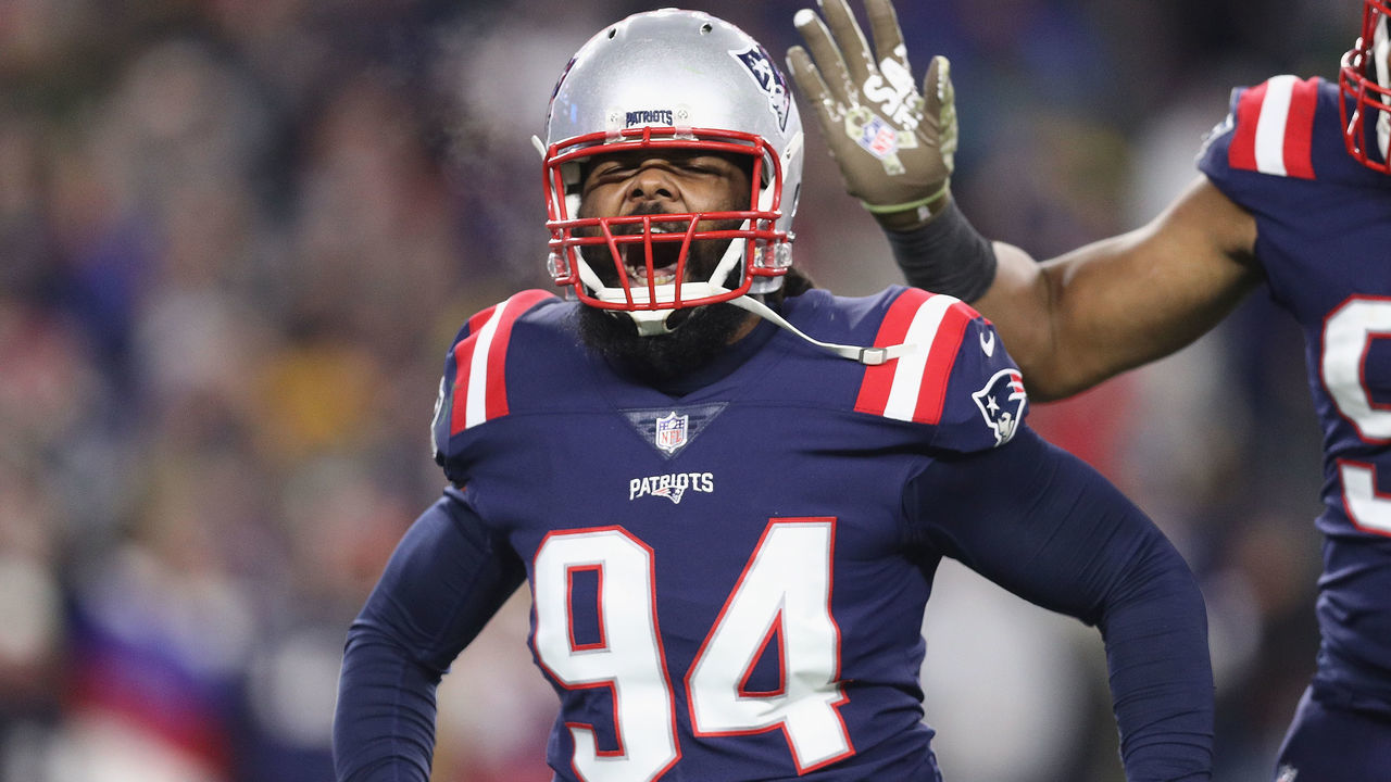 FOXBOROUGH, MA - NOVEMBER 04: Adrian Clayborn #94 of the New England Patriots celebrates after sacking Aaron Rodgers #12 of the Green Bay Packers (not pictured) during the second half at Gillette Stadium on November 4, 2018 in Foxborough, Massachusetts.