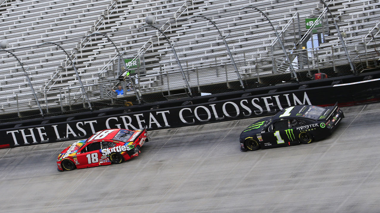 BRISTOL, TN - APRIL 07: #1: Kurt Busch, Chip Ganassi Racing, Chevrolet Camaro Monster Energy chases down his brother, Kyle Busch, Joe Gibbs Racing, Toyota Camry Skittles during the running of the 59th Annual Food City 500 Monster Energy NASCAR Cup Series race on April 7, 2019 at Bristol Motor Speedway in Bristol, TN.