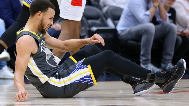 NEW ORLEANS, LOUISIANA - APRIL 09: Stephen Curry #30 of the Golden State Warriors reacts after falling down during the first half against the New Orleans Pelicans at the Smoothie King Center on April 09, 2019 in New Orleans, Louisiana.