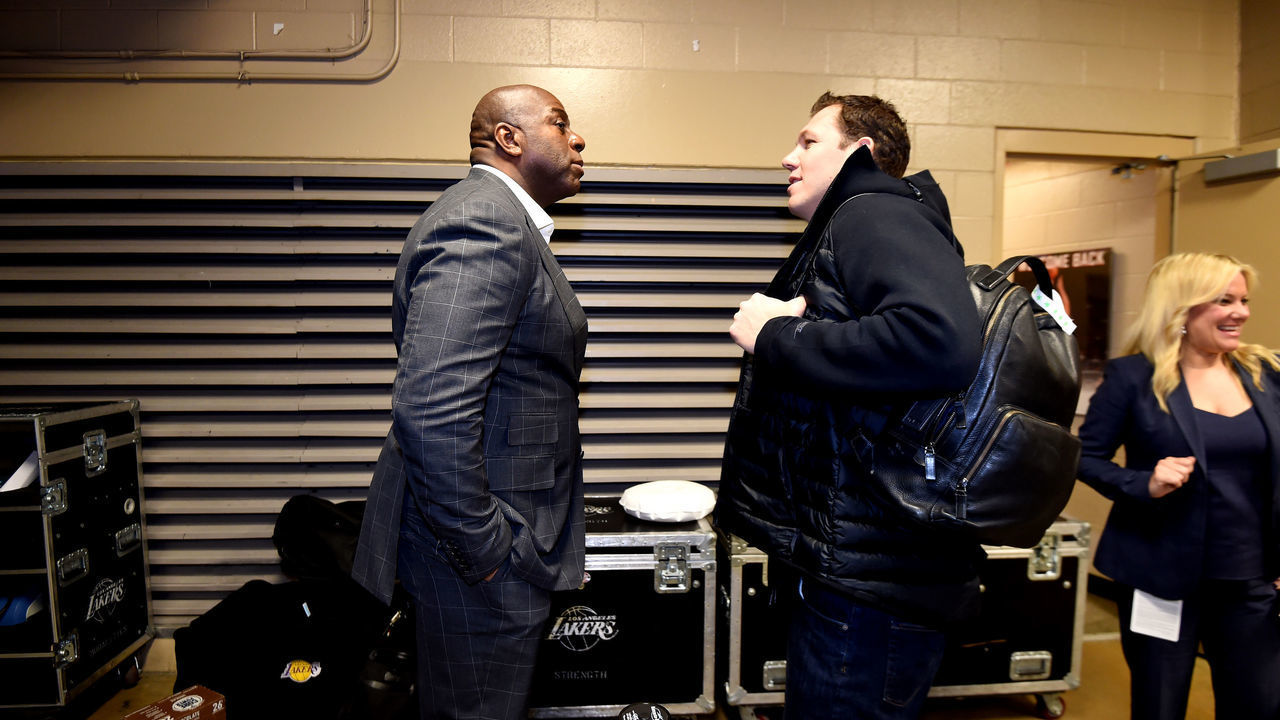 PHILADELPHIA, PA - FEBRUARY 10: Owner Magic Johnson and Head Coach Luke Walton of the Los Angeles Lakers talk before the game against the Philadelphia 76ers on February 10, 2019 at the Wells Fargo Center in Philadelphia, Pennsylvania NOTE TO USER: User expressly acknowledges and agrees that, by downloading and/or using this Photograph, user is consenting to the terms and conditions of the Getty Images License Agreement. Mandatory Copyright Notice: Copyright 2019 NBAE
