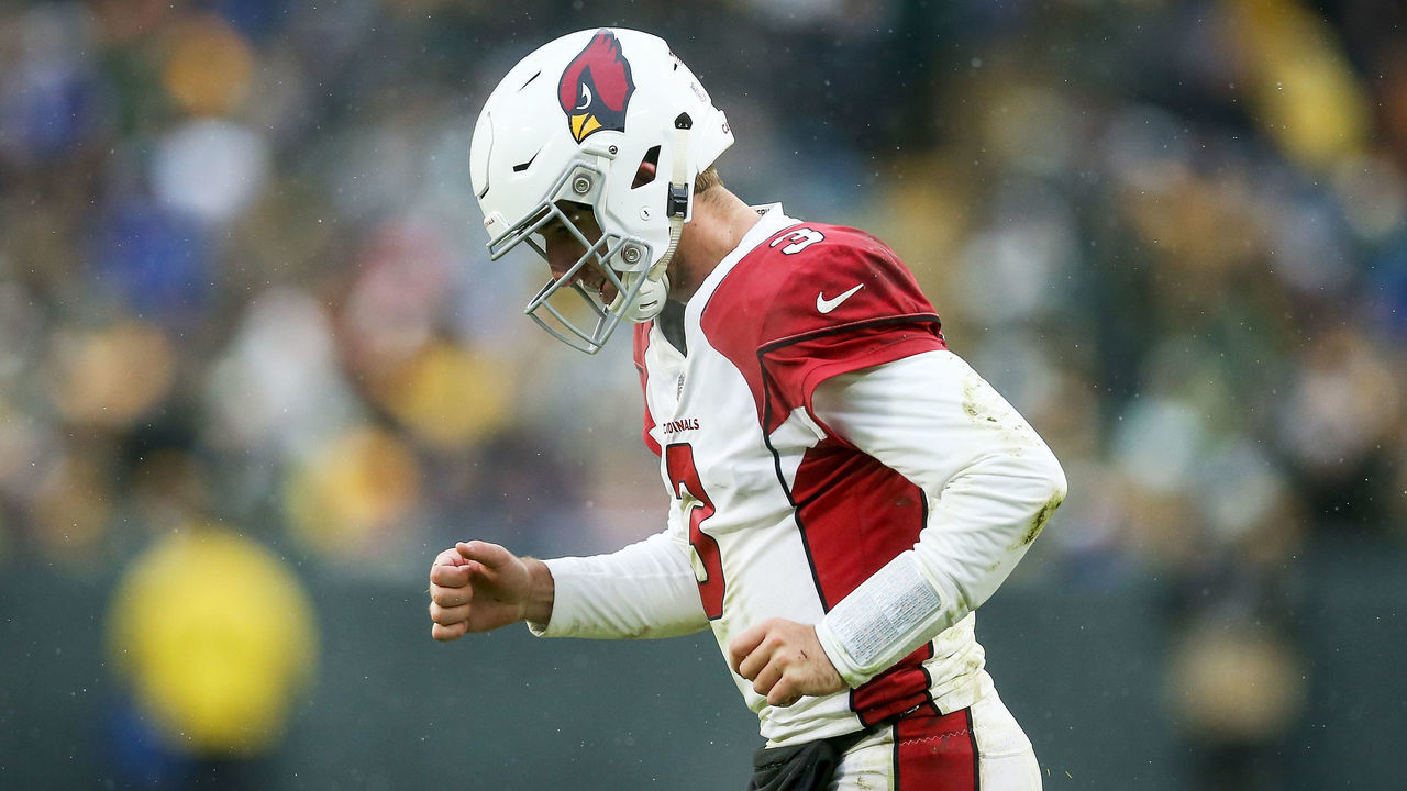 GREEN BAY, WISCONSIN - DECEMBER 02: Josh Rosen #3 of the Arizona Cardinals jogs across the field in the fourth quarter against the Green Bay Packers at Lambeau Field on December 02, 2018 in Green Bay, Wisconsin.