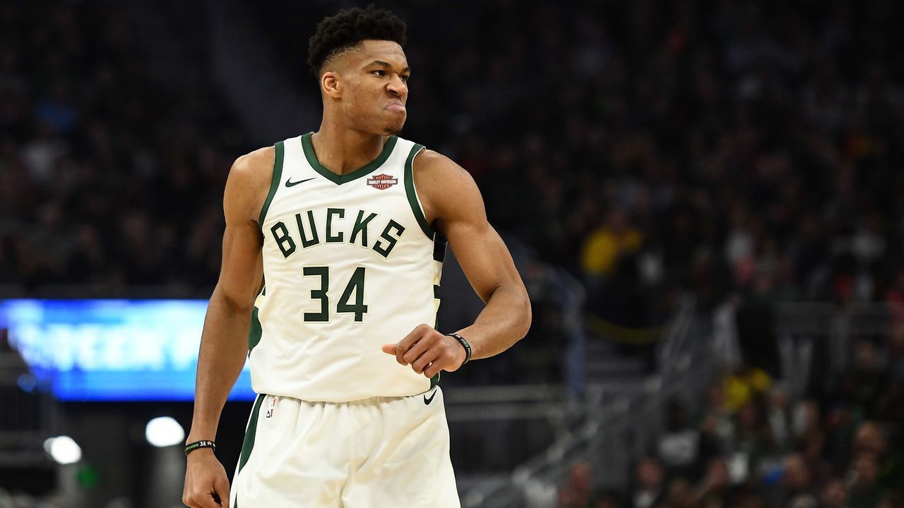 MILWAUKEE, WISCONSIN - MARCH 26: Giannis Antetokounmpo #34 of the Milwaukee Bucks reacts to a dunk against the Houston Rockets during a game at Fiserv Forum on March 26, 2019 in Milwaukee, Wisconsin.