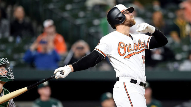BALTIMORE, MD - APRIL 10: Chris Davis #19 of the Baltimore Orioles flys out in the ninth inning against the Oakland Athletics at Oriole Park at Camden Yards on April 10, 2019 in Baltimore, Maryland.