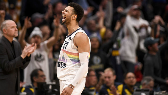 DENVER, CO - APRIL 10: Jamal Murray (27) of the Denver Nuggets celebrates after making a three over Andrew Wiggins (22) of the Minnesota Timberwolves to take the lead with 31 seconds left during the fourth quarter of the Nuggets' 99-95 win on Wednesday, April 10, 2019.