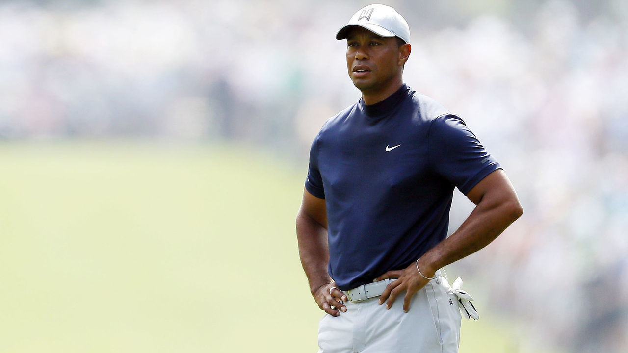 AUGUSTA, GEORGIA - APRIL 11: Tiger Woods of the United States stands on the first hole during the first round of the Masters at Augusta National Golf Club on April 11, 2019 in Augusta, Georgia.