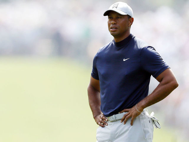 AUGUSTA, GEORGIA - APRIL 11: Tiger Woods of the United States stands on the first hole during the first round of the Masters at Augusta National Golf Club on April 11, 2019 in Augusta, Georgia.