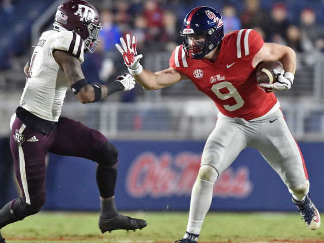 OXFORD, MS - NOVEMBER 18: Mississippi Rebels tight end Dawson Knox (9) looks to avoid a Texas A&M Aggies defender after making a catch during the second quarter of a college football game on November 18, 2017, at Vaught-Hemmingway Stadium in Oxford, MS.