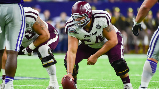 HOUSTON, TX - DECEMBER 28: Texas A&M Aggies offensive lineman Erik McCoy (64) prepares to snap the ball during the Texas Bowl between the Texas A&M Aggies and Kansas State Wildcats on December 28, 2016, at NRG Stadium in Houston, Texas.