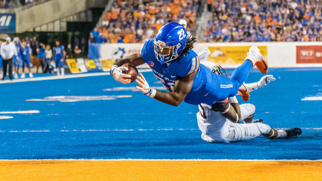 BOISE, ID - SEPTEMBER 08: Boise State Broncos running back Alexander Mattison (22) dives into the endzone for a touchdown during the game between the Connecticut Huskies vs the Boise Broncos on Saturday, September 8, 2018, at Albertsons Stadium in Boise, Idaho.