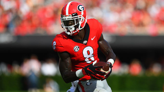 ATHENS, GA - SEPTEMBER 29: Riley Ridley #8 of the Georgia Bulldogs runs after a catch against the Tennessee Volunteers on September 29, 2018 at Sanford Stadium in Athens, Georgia.
