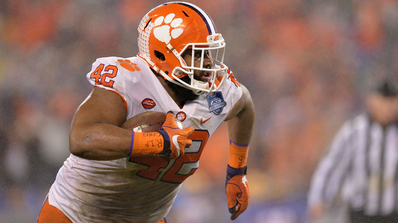 CHARLOTTE, NC - DECEMBER 01: Christian Wilkins #42 of the Clemson Tigers runs the ball against the Pittsburgh Panthers in the second quarter during their game at Bank of America Stadium on December 1, 2018 in Charlotte, North Carolina.