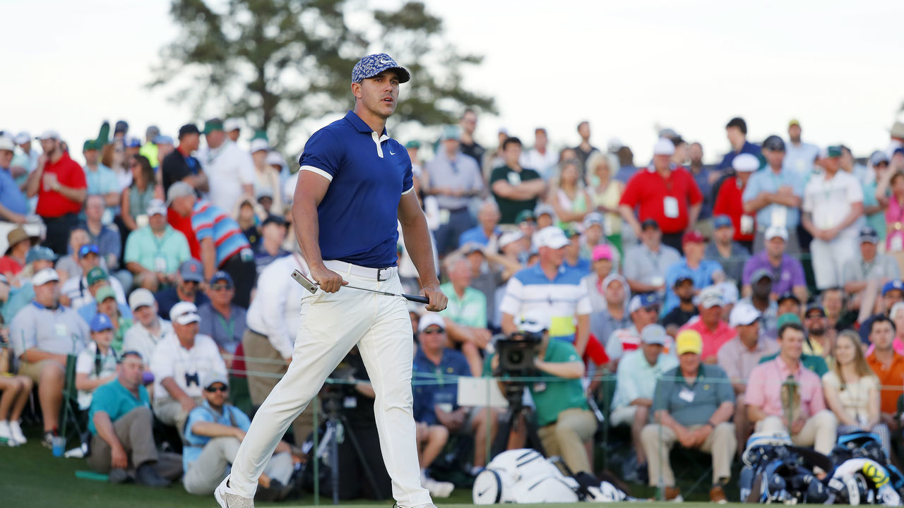 AUGUSTA, GEORGIA - APRIL 11: Brooks Koepka of the United States reacts to a missed birdie putt on the 18th green during the first round of the Masters at Augusta National Golf Club on April 11, 2019 in Augusta, Georgia.