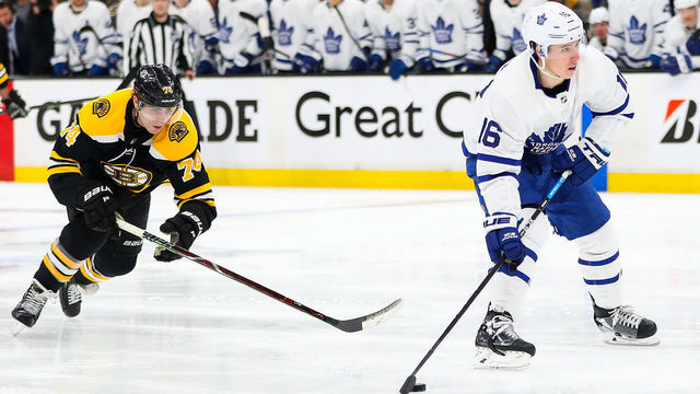 BOSTON, MA - APRIL 11: Jake DeBrusk #74 of the Boston Bruins causes a penalty on Mitchell Marner #16 of the Toronto Maple Leafs in the second period in Game One of the Eastern Conference First Round during the 2019 NHL Stanley Cup Playoffs at TD Garden on April 11, 2019 in Boston, Massachusetts.