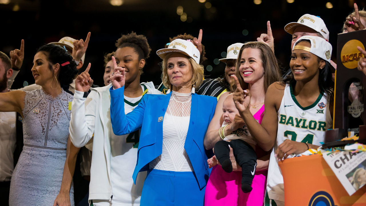 TAMPA, FL - APRIL 07: Head Coach Kim Mulkey and the Baylor Bears pose with the Championship Trophy after winning the NCAA Division I Women's National Championship Game against the Notre Dame Fighting Irish on April 07, 2019, at Amalie Arena in Tampa, Florida.