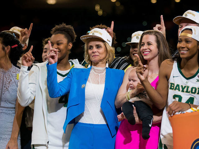 TAMPA, FL - APRIL 07: Head Coach Kim Mulkey and the Baylor Bears pose with the Championship Trophy after winning the NCAA Division I Women's National Championship Game against the Notre Dame Fighting Irish on April 07, 2019, at Amalie Arena in Tampa, Florida.