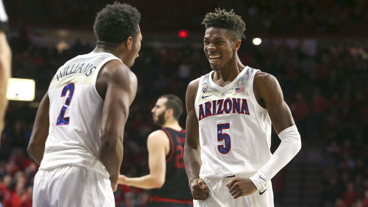 TUCSON, AZ - FEBRUARY 24: Arizona Wildcats guard Brandon Randolph (5) celebrates with Arizona Wildcats guard Brandon Williams (2) in the second half during the a college basketball game between the Stanford Cardinal and the Arizona Wildcats on February 24, 2019, at McKale Center in Tucson, AZ.