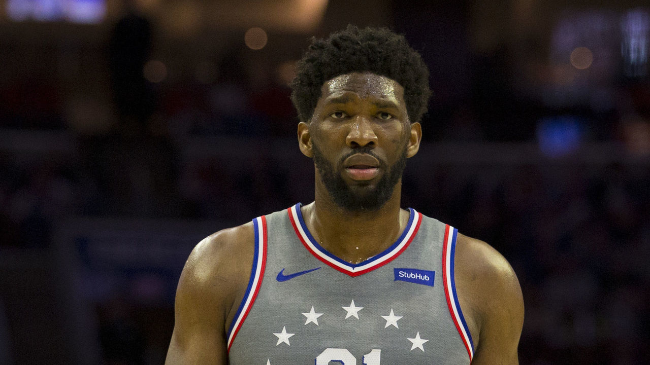 PHILADELPHIA, PA - APRIL 04: Joel Embiid #21 of the Philadelphia 76ers looks on against the Milwaukee Bucks at the Wells Fargo Center on April 4, 2019 in Philadelphia, Pennsylvania. The Bucks defeated the 76ers 128-122.