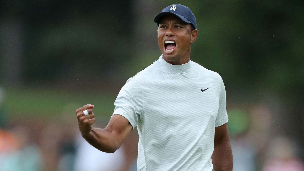 AUGUSTA, GEORGIA - APRIL 12: Tiger Woods of the United States celebrates after making a putt for birdie on the 15th green during the second round of the Masters at Augusta National Golf Club on April 12, 2019 in Augusta, Georgia.