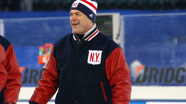NEW YORK, NY - JANUARY 1: New York Rangers head coach Alain Vigneault leaves the ice after defeating the Buffalo Sabres at the 2018 Bridgestone NHL Winter Classic at Citi Field on January 1, 2018 in New York, New York.