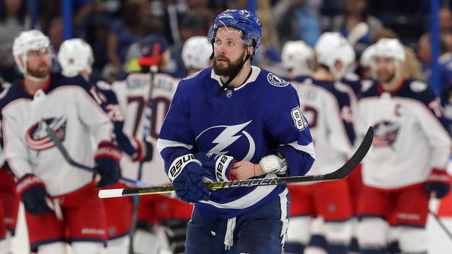 TAMPA, FL - APRIL 10: Nikita Kucherov #86 of the Tampa Bay Lightning reacts as members of the Columbus Blue Jackets celebrate at the end of Game One of the Eastern Conference First Round during the 2019 NHL Stanley Cup Playoffs at Amalie Arena on April 10, 2019 in Tampa, Florida.