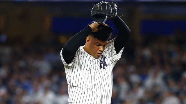 NEW YORK, NEW YORK - OCTOBER 09: Dellin Betances #68 of the New York Yankees reacts against the Boston Red Sox during the eighth inning in Game Four of the American League Division Series at Yankee Stadium on October 09, 2018 in the Bronx borough of New York City.