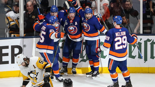UNIONDALE, NY - APRIL 12: New York Islanders right wing Josh Bailey (12) celebrates his goal with teammates New York Islanders center Brock Nelson (29), New York Islanders defenseman Devon Toews (25), New York Islanders left wing Anders Lee (27) and New York Islanders right wing Jordan Eberle (7) during the third period of game 2 of the first round of the Stanley Cup Playoffs between the New York Islanders and the Pittsburgh Penguins on April 14, 2019 at the Nassau Veterans Memorial Coliseum in Uniondale, NY.