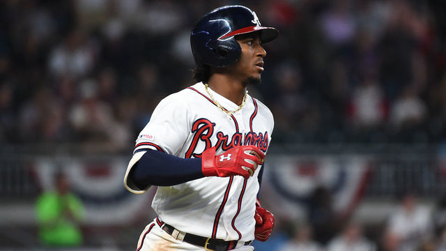 ATLANTA, GEORGIA - APRIL 06: Ozzie Albies #1 of the Atlanta Braves runs to first base in the 8th inning against the Miami Marlins at SunTrust on April 06, 2019 in Atlanta, Georgia.
