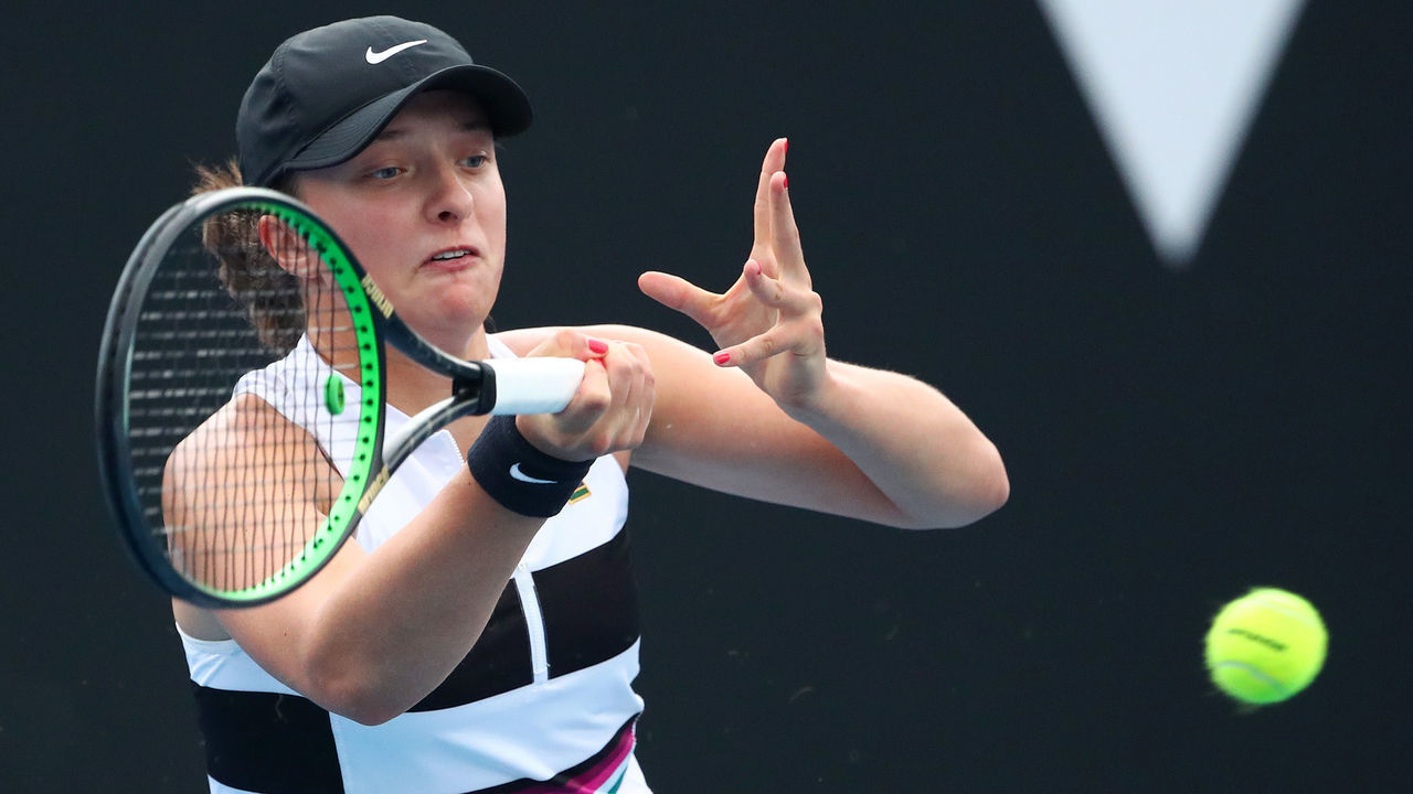 MELBOURNE, AUSTRALIA - JANUARY 17: Iga Swiatek of Poland plays a forehand in her second round match against Camila Giorgi of Italy during day four of the 2019 Australian Open at Melbourne Park on January 17, 2019 in Melbourne, Australia.