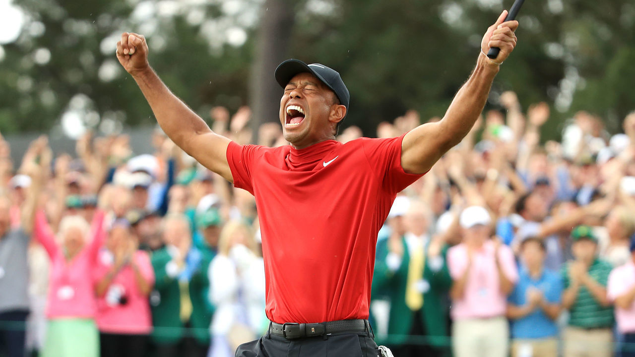 AUGUSTA, GEORGIA - APRIL 14: Tiger Woods of the United States celebrates after sinking his putt to win during the final round of the Masters at Augusta National Golf Club on April 14, 2019 in Augusta, Georgia.