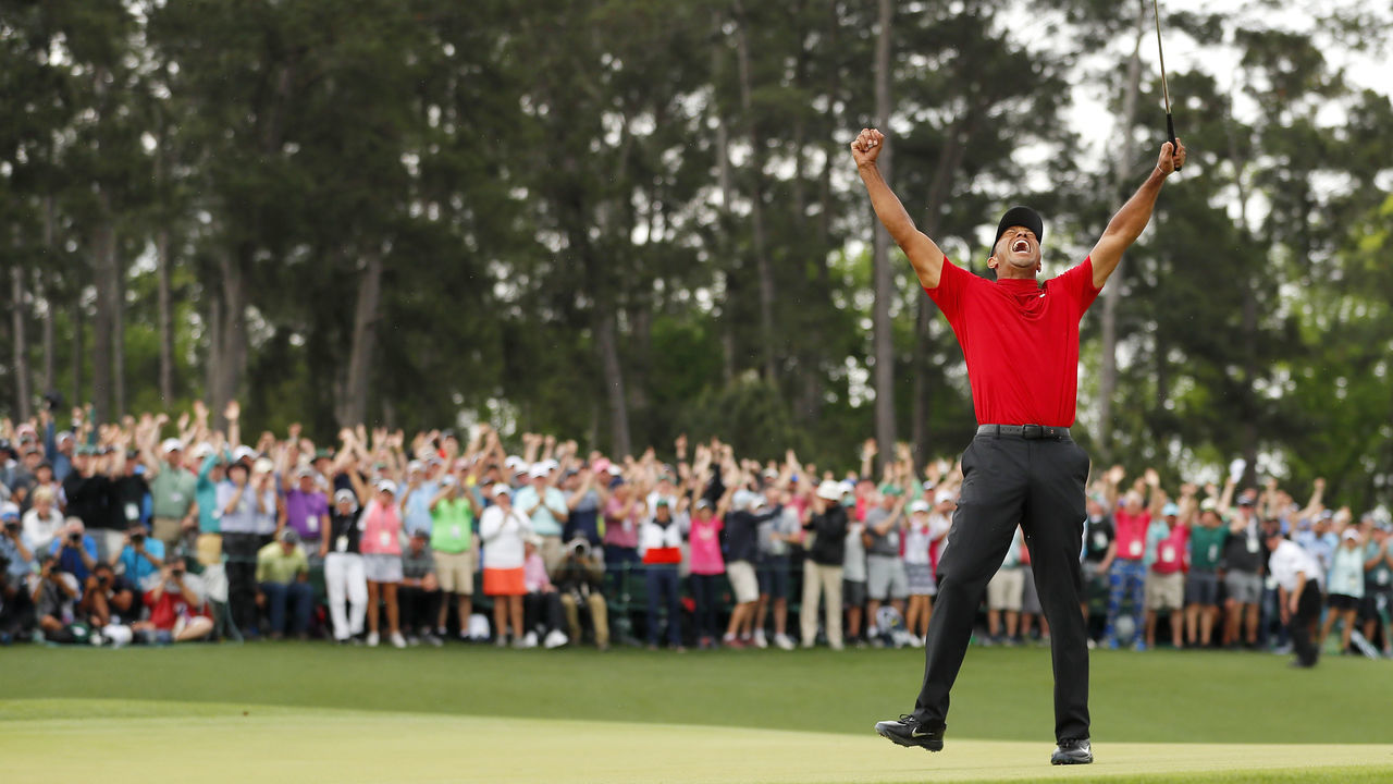 AUGUSTA, GEORGIA - APRIL 14: Tiger Woods of the United States celebrates after sinking his putt to win during the final round of the Masters at Augusta National Golf Club on April 14, 2019 in Augusta, Georgia.
