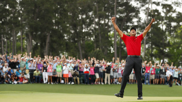 AUGUSTA, GEORGIA - APRIL 14: Tiger Woods of the United States celebrates after sinking his putt to win during the final round of the Masters at Augusta National Golf Club on April 14, 2019 in Augusta, Georgia.