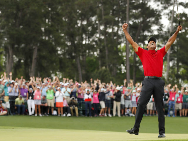 AUGUSTA, GEORGIA - APRIL 14: Tiger Woods of the United States celebrates after sinking his putt to win during the final round of the Masters at Augusta National Golf Club on April 14, 2019 in Augusta, Georgia.