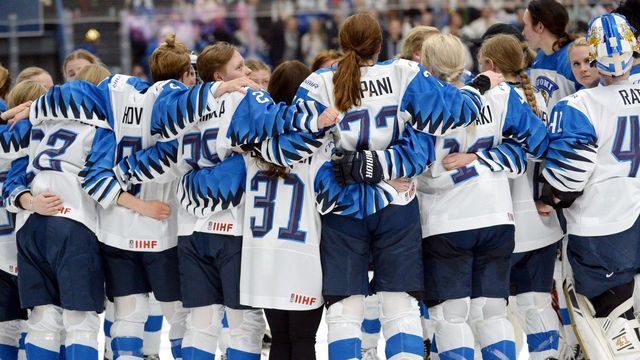 Finnish players form a huddle as they wait for the referee's decision after Finland scored a game-winning overtime goal which was later disallowed during the IIHF Women's Ice Hockey World Championships final match between the United States and Finland in Espoo, Finland, on April 14, 2019.
