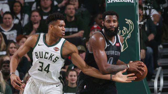 MILWAUKEE, WI - APRIL 14: Andre Drummond #0 of the Detroit Pistons handles the ball during the game against Giannis Antetokounmpo #34 of the Milwaukee Bucks during Game One of Round One of the 2019 NBA Playoffs on April 14, 2019 at the Fiserv Forum in Milwaukee, Wisconsin. Mandatory Copyright Notice: Copyright 2019 NBAE