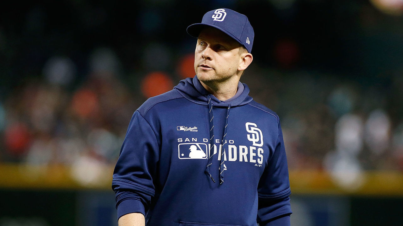 PHOENIX, AZ - APRIL 12: Manager Andy Green #14 of the San Diego Padres walks back to the dugout after a visit to the mound during the sixth inning of an MLB game against the Arizona Diamondbacks at Chase Field on April 12, 2019 in Phoenix, Arizona.