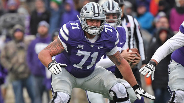 MANHATTAN, KS - NOVEMBER 17: Offensive lineman Dalton Risner #71 of the Kansas State Wildcats gets set to make a block during the first half against the Texas Tech Red Raiders at Bill Snyder Family Football Stadium on November 17, 2018 in Manhattan, Kansas.