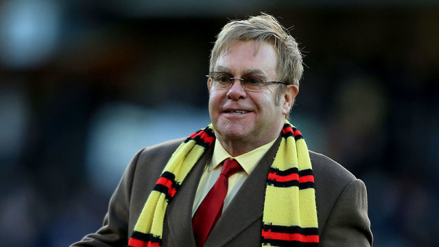 Watford Life President Sir Elton John takes to the pitch as the new stand at Vicarage Road is named in his honour