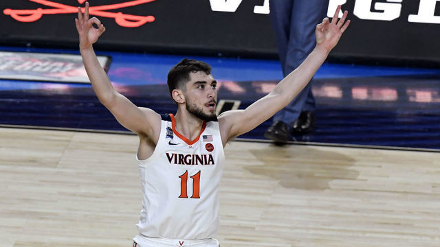 MINNEAPOLIS, MINNESOTA - APRIL 08: Ty Jerome #11 of the Virginia Cavaliers celebrates the play against the Texas Tech Red Raiders in the first half during the 2019 NCAA men's Final Four National Championship game at U.S. Bank Stadium on April 08, 2019 in Minneapolis, Minnesota.