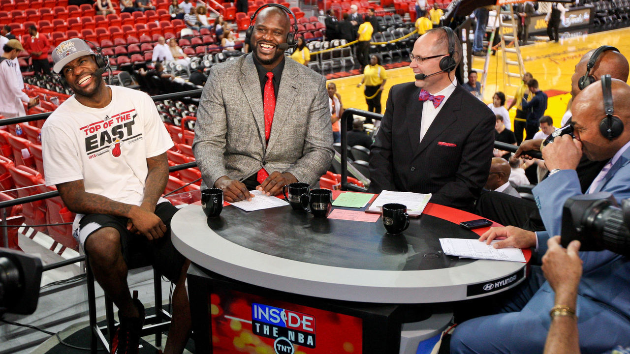 MIAMI, FL - JUNE 3: LeBron James #6 of the Miami Heat, from left, laughs while being interviewed by TNT analysts Shaquille O'Neal, Ernie Johnson Jr., Kenny Smith and Charles Barkley following the Heat's series victory against the Indiana Pacers in Game Seven of the Eastern Conference Finals during the 2013 NBA Playoffs on June 3, 2013 at American Airlines Arena in Miami, Florida. NOTE TO USER: User expressly acknowledges and agrees that, by downloading and/or using this photograph, user is consenting to the terms and conditions of the Getty Images License Agreement. Mandatory copyright notice: Copyright NBAE 2013