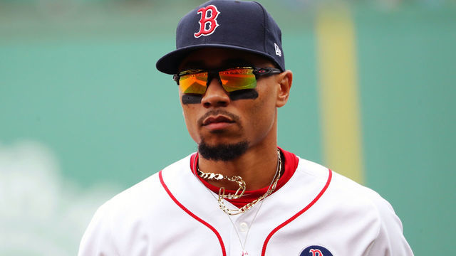 BOSTON, MA - APRIL 15: Mookie Betts #42 of the Boston Red Sox takes the field during the game between the Baltimore Orioles and the Boston Red Sox at Fenway Park on Monday, April 15, 2019 in Boston, Massachusetts.
