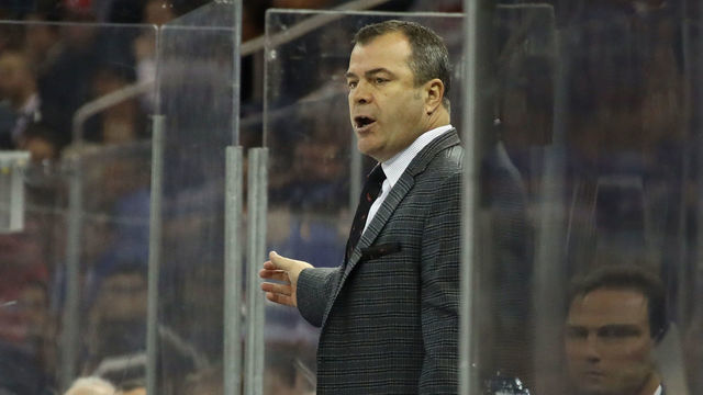 NEW YORK, NY - JANUARY 03: Alain Vigneault of the New York Rangers handles bench dutes during the third period against the Chicago Blackhawks at Madison Square Garden on January 3, 2018 in New York City. The Blackhawks defeated the Rangers 5-2.