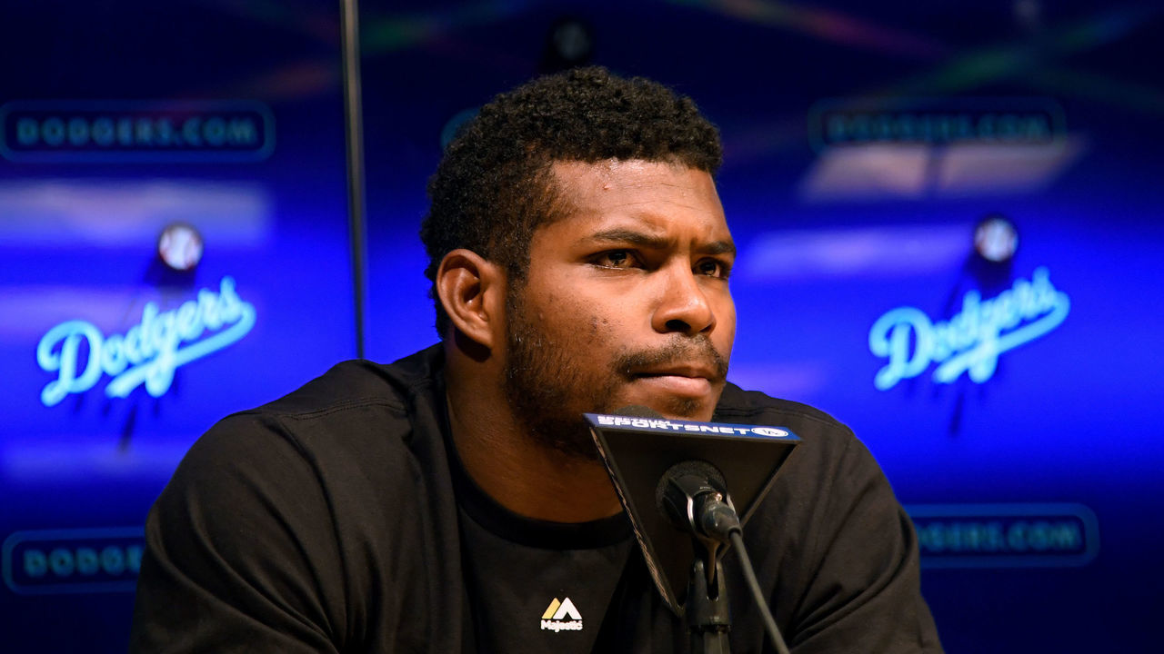 LOS ANGELES, CALIFORNIA - APRIL 15: Former Los Angeles Dodgers Yasiel Puig, now of the Cincinnati Reds, reacts to questions at a press conference before the game on Jackie Robinson Day at Dodger Stadium on April 15, 2019 in Los Angeles, California.