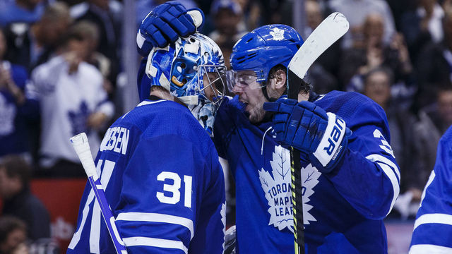 TORONTO, ON - APRIL 15: Frederik Andersen #31 of the Toronto Maple Leafs celebrates his win over the Boston Bruins with teammate Auston Matthews #34 in Game Three of the Eastern Conference First Round during the 2019 NHL Stanley Cup Playoffs at the Scotiabank Arena on April 15, 2019 in Toronto, Ontario, Canada.