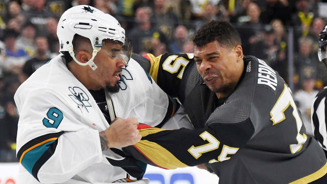 LAS VEGAS, NEVADA - APRIL 14: Evander Kane #9 of the San Jose Sharks and Ryan Reaves #75 of the Vegas Golden Knights fight in the third period of Game Three of the Western Conference First Round during the 2019 NHL Stanley Cup Playoffs at T-Mobile Arena on April 14, 2019 in Las Vegas, Nevada. The Golden Knights defeated the Sharks 6-3 to take a 2-1 lead in the series.
